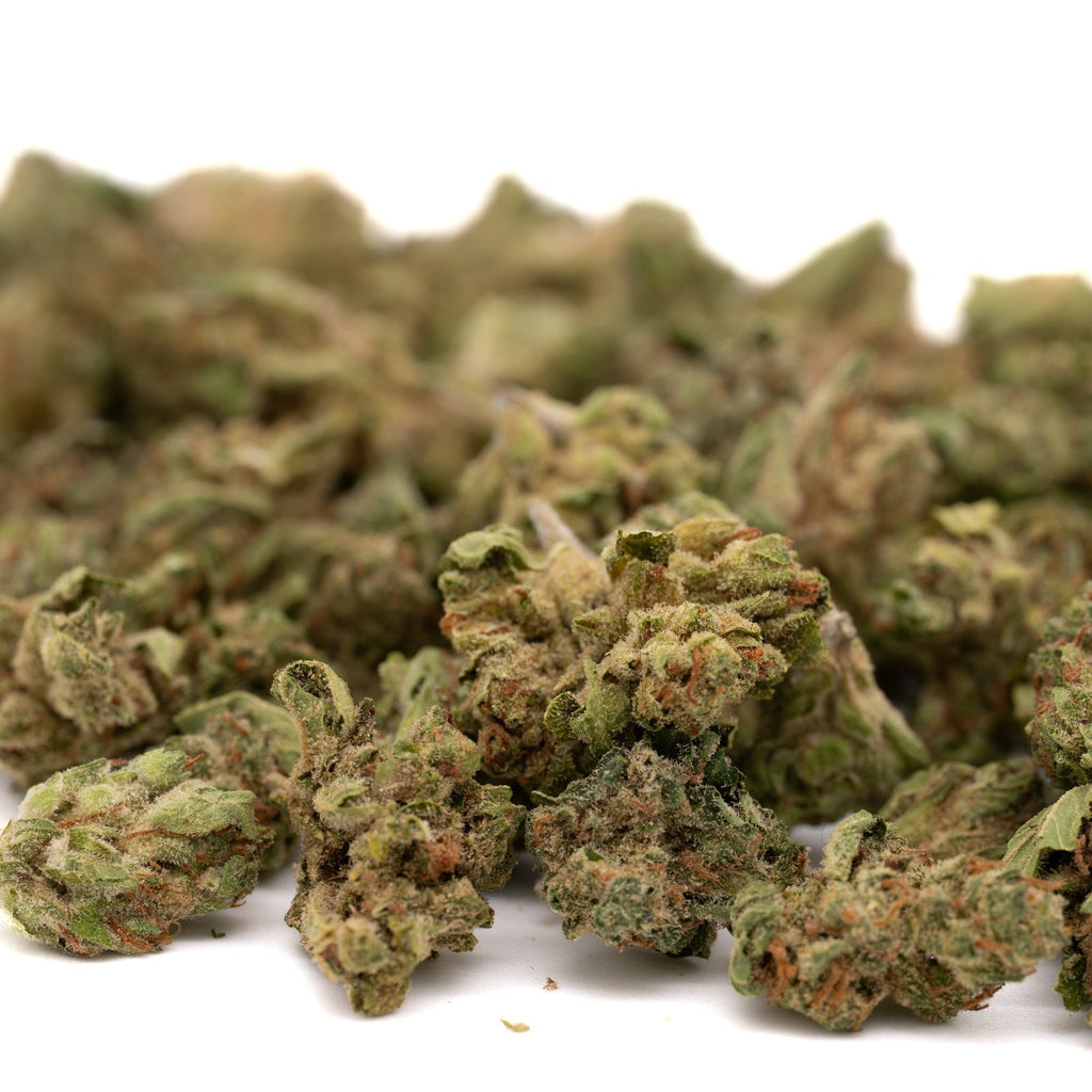 Lucky Charms THCa Hemp Flower Smalls showing green and orange cannabis buds covered in trichomes